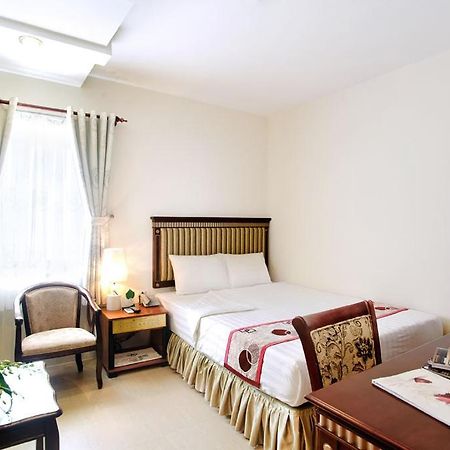 Anh Minh Hotel Cidade de Ho Chi Minh Quarto foto