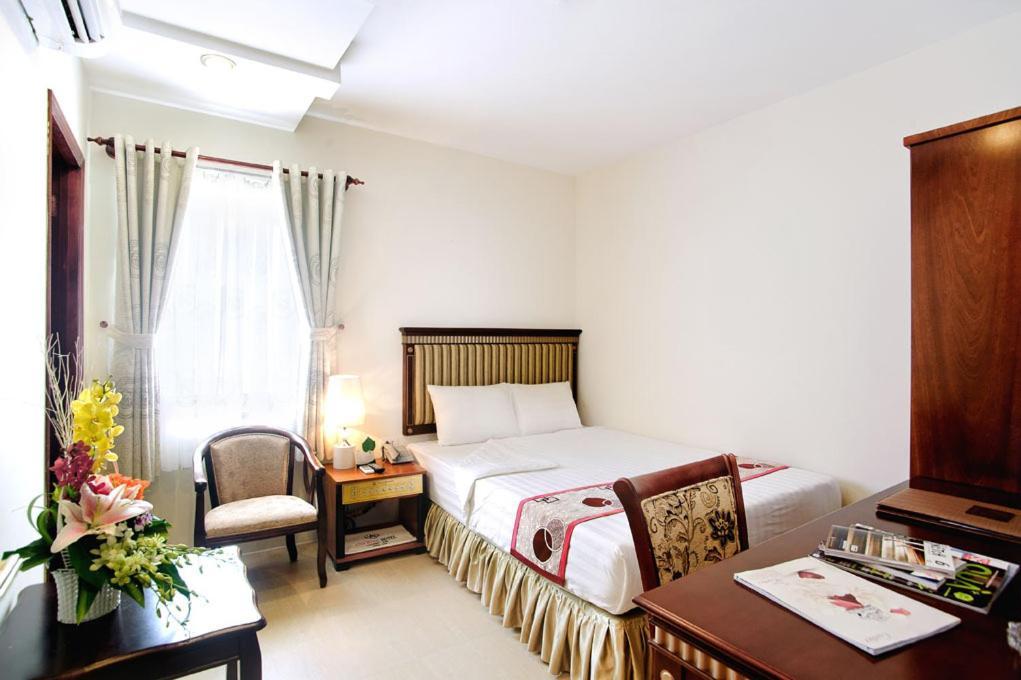 Anh Minh Hotel Cidade de Ho Chi Minh Quarto foto